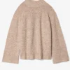 Beige ribbstickad tröja