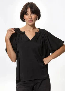 Svart blus med puffärm